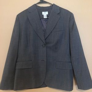 Orange pinstripes on dark gray blazer.